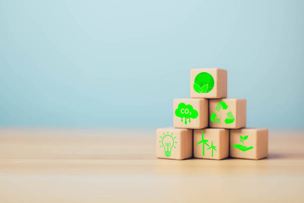 istock ESG Concepts on Environment, Natural environment, Wooden blocks are stacked on a table with ESG icons on wood block stack, light blue background. 2190626328