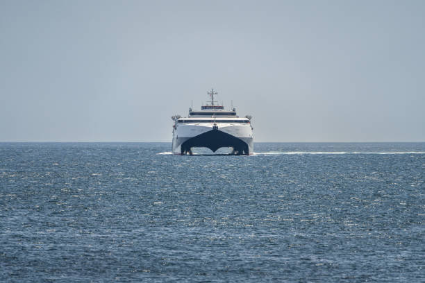 Douglas, Isle of Man - May 23, 2023: A high speed catamaran ferry arriving in Douglas Bay