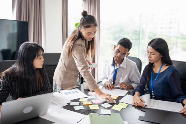 istock Business asian Multicultural businesspeople working project  working together in office conference ideas in startup at office Diversity leadership and business people 2190634132