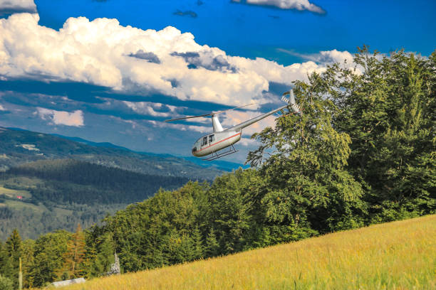 istock A small light helicopter lands in the mountains during a rescue operation 2190637113