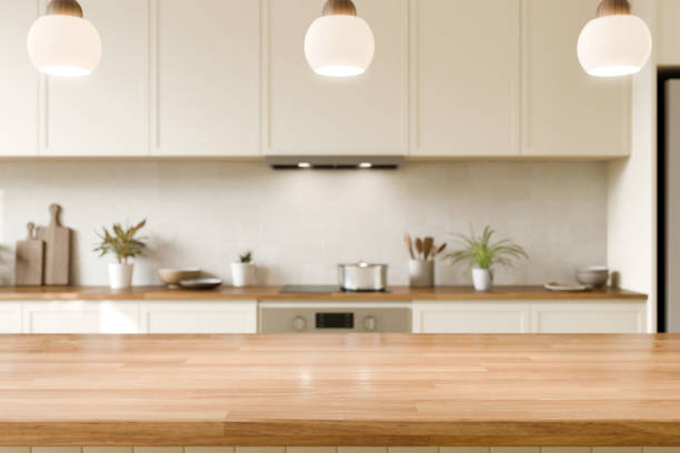 istock Modern Kitchen Interior with Wooden Counter top. Wood table top with blurred kitchen background. 3d render. 2190638183