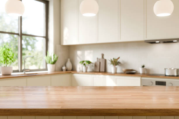 istock Modern Kitchen Interior with Bright Natural Light. Wood counter top with blurred kitchen background. 3d render. 2190638192