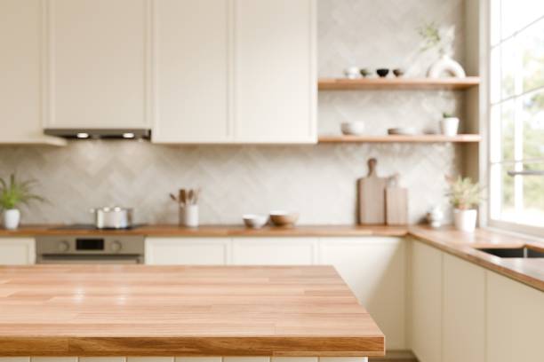 istock Modern Kitchen with Warm Wood and Neutral Tones. Wood top with blurred kitchen background. 3d render. 2190638210