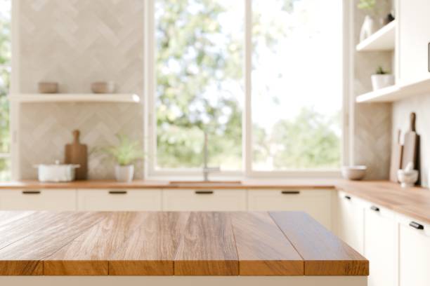 Empty wood counter top with blurred kitchen background. Modern Kitchen with Warm Wooden Accents and Light. 3d render.