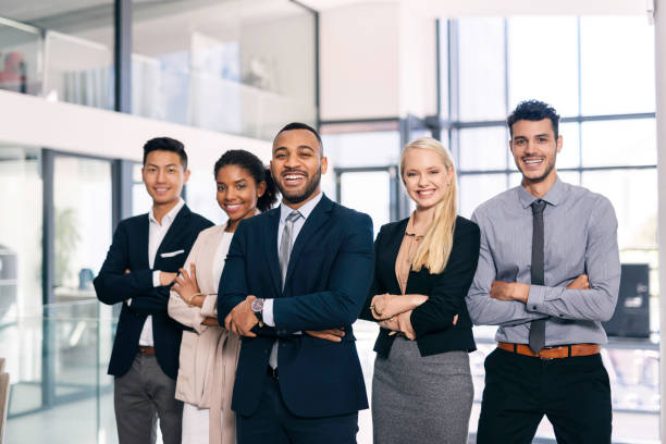 istock Confident and Diverse Business Team Posing in Modern Office Environment 2190639131