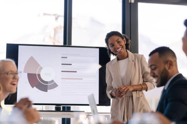 istock Confident Business Presentation with Multiracial Team in Modern Office Setting 2190639134