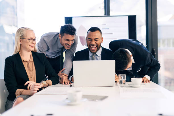 istock Diverse Business Team Sharing a Laugh During a Successful Presentation 2190639142
