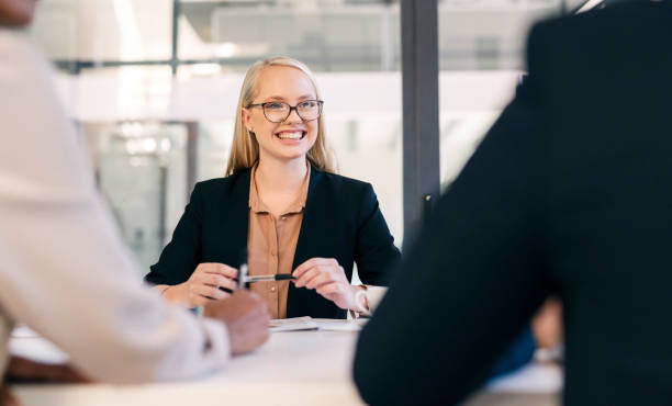 istock Confident Businesswoman Leading a Meeting in a Modern Office Setting 2190639149