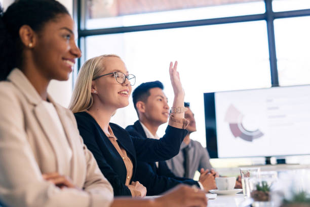 Energetic Business Meeting with Diverse Team Collaborating in Modern Office