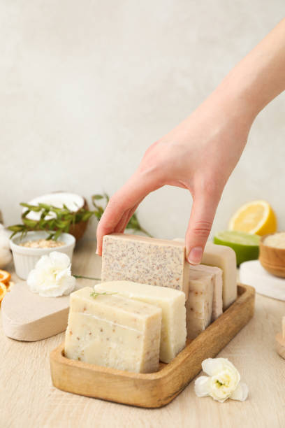 istock Natural handmade soap with ingredients, on a light background. 2190639163