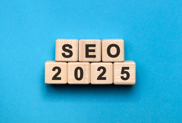 istock Seo 2025 concept. Wooden cubes on a black keyboard 2190641473