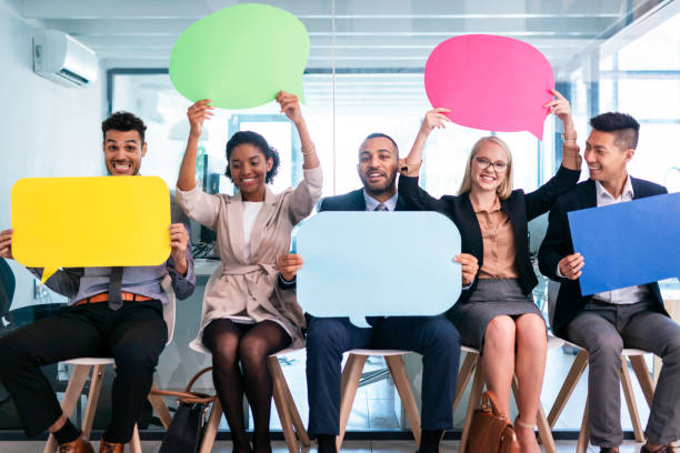 istock Diverse Candidates in a Job Interview Holding Thought Bubbles 2190643740