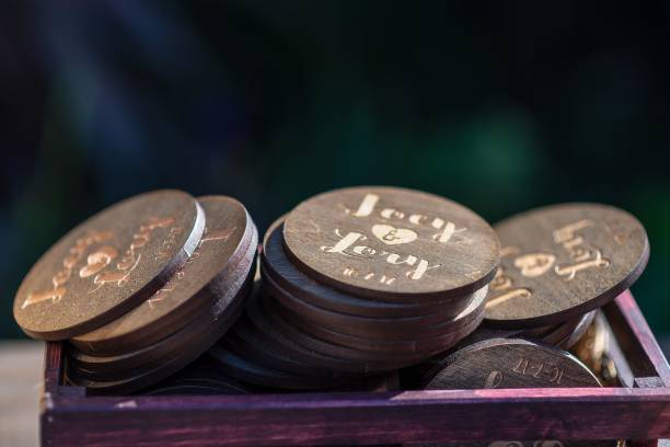 Personalized wooden tokens featuring unique designs for special occasions