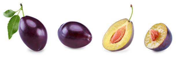 istock fresh plum fruit with green leaf and cut plum slices isolated on white background. clipping path 2190644711