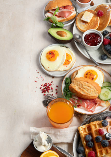 istock Fresh healthy breakfast. Table with full healthy breakfast. 2190645979