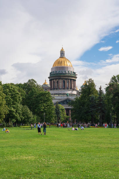 St. Petersburg, Russia - August 12, 2024: Historical architecture. Travel inspiration. The center of Saint Petersburg on a sunny summer day. St. Isaacs Cathedral against the beautiful sky.