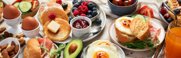 istock Fresh healthy breakfast. Table with full healthy breakfast. 2190646238