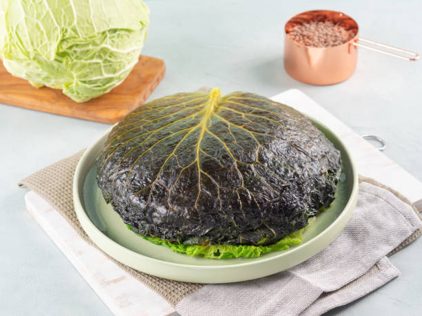 Chou farci, stuffed savoy cabbage pie with lentil quinoa ragu