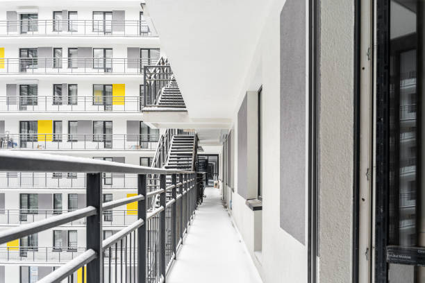 istock the courtyard of a multi-storey building. a multi-storey hotel , apartment or hostel. Everything is covered with snow. View of the large balconies and windows of the apartment building. 2190649676