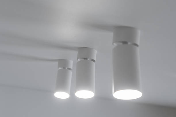 istock small ceiling lights in white on a white flat ceiling. modern lighting in an apartment or house. the repair process. modern renovation 2190649752
