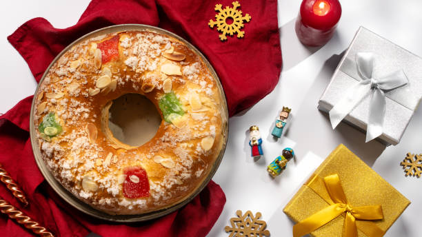 istock Spanish Three kings cake on decorated table with gifts and burning candles, celebration of Three Kings Day holiday 2190653849