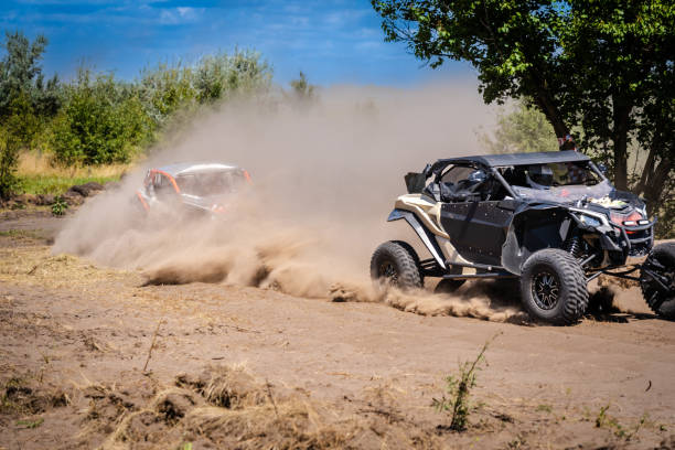 istock Cool view on hard ride UTV on sandy track. 4x4, extreme, adrenalin. 2190656540
