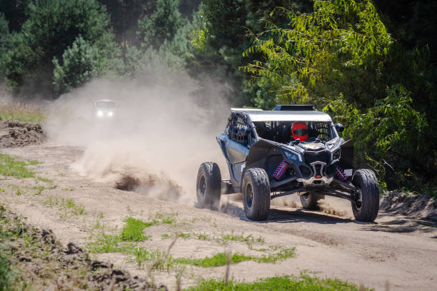 istock UTV buggy, 4x4 competition on dusty road. Rally, extreme, adrenalin 2190656542