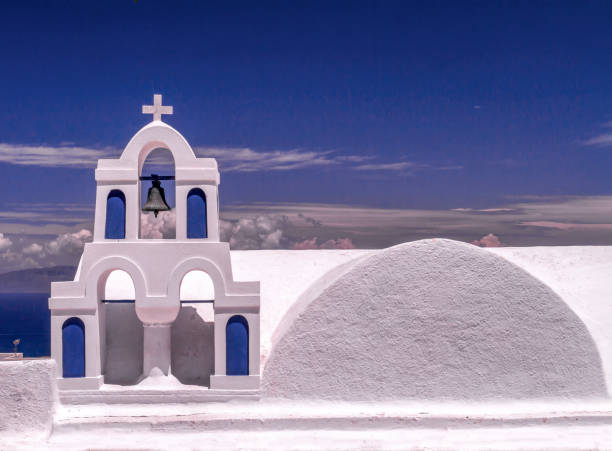 Small bell tower in Oia on Santorini. Oia is located on the north-western coast of Santorini.