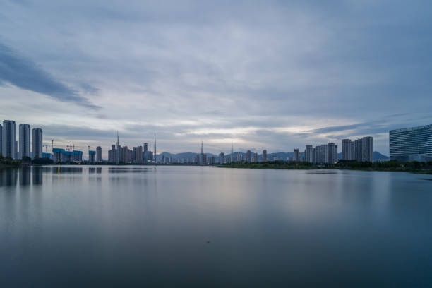 Lakeside city skyline at evening
