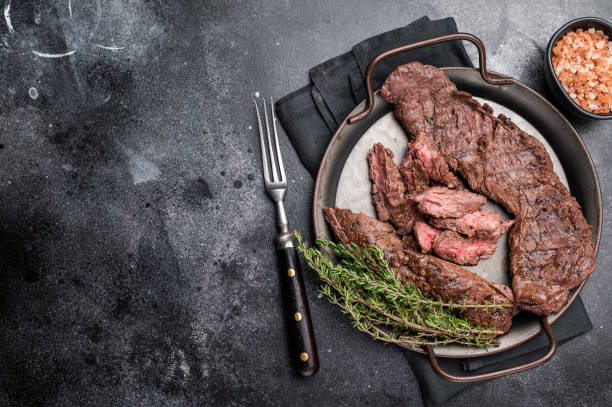 istock Grilled Beef Machete Skirt Steak, prime meat. black background. top view 2190667059