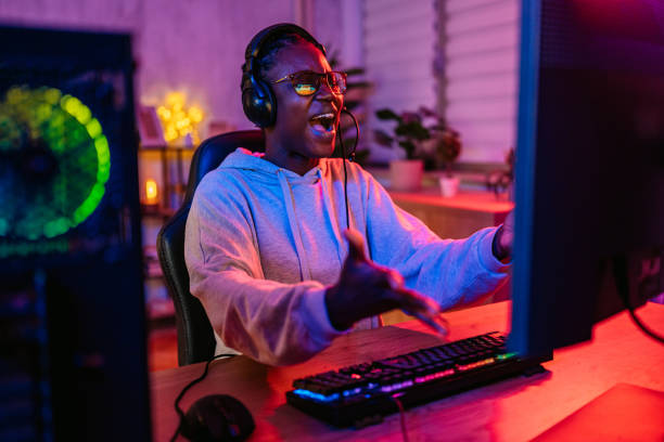istock Young Black Woman Losing While Playing A Video Game On Her Desktop PC 2190672305
