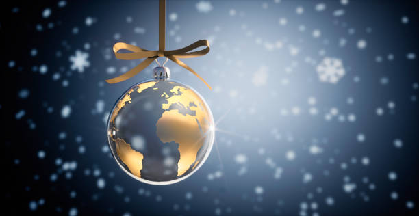 Glass Christmas ball with golden earth map