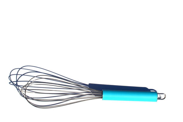 Close up of unrecognizable chef holding whisk - Cooking concepts