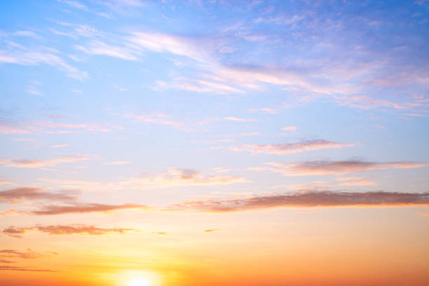 istock Sky,sunset, beautiful , luxury soft gradient orange gold clouds and sunlight on the blue sky perfect for the background, Sunrise on morning or everning in winter warm time ,Twilight summer,silhouette 2190684508