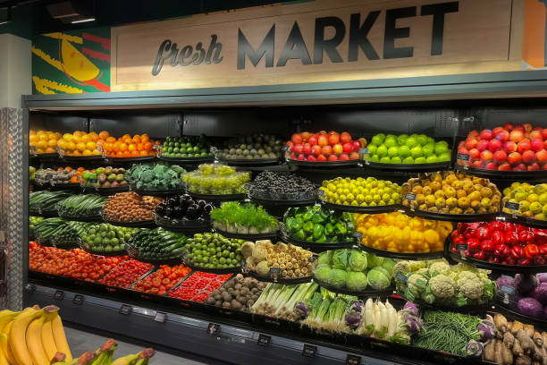 istock Vibrant Fresh Produce Section in Grocery Store 2190684686