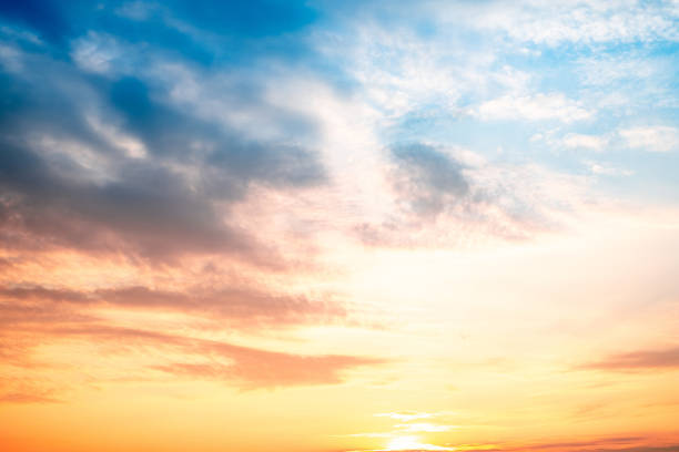 istock Sky,sunset, beautiful , luxury soft gradient orange gold clouds and sunlight on the blue sky perfect for the background, Sunrise on morning or everning in winter warm time ,Twilight summer,silhouette 2190685292