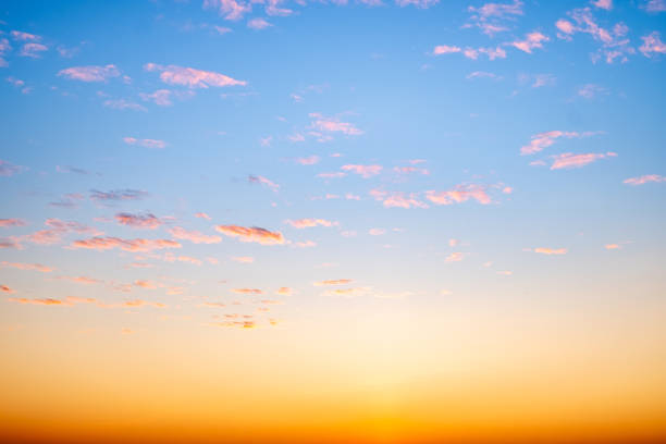 istock Beautiful , luxury soft gradient orange gold clouds and sunlight on the blue sky perfect for the background, take in everning,Twilight, Large size, high definition landscape photo 2190685398