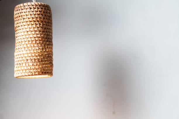 istock Woven Rattan Pendant Light on White Wall 2190685848