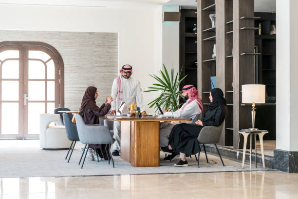 istock Confident Arabic Business Executives Collaborating in Modern Office 2190686938