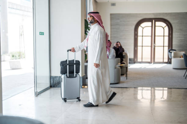 istock Confident Arabic Businessman Exiting Luxurious Hotel 2190686977