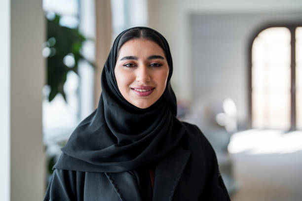 istock Confident Arabic Businesswoman Networking in Hotel Lobby 2190686996