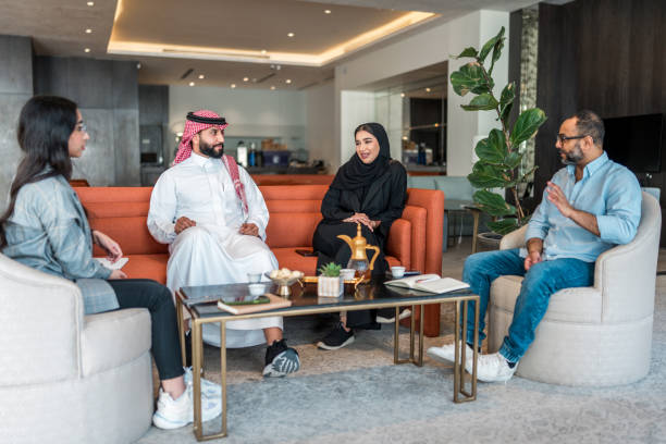 istock Engaged Arabic Business Professionals Discussing Strategy in a Hotel Lobby 2190687032