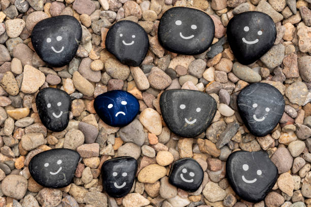 Picture stones concept for mental health depression feeling low, sad, miserable, and dejected