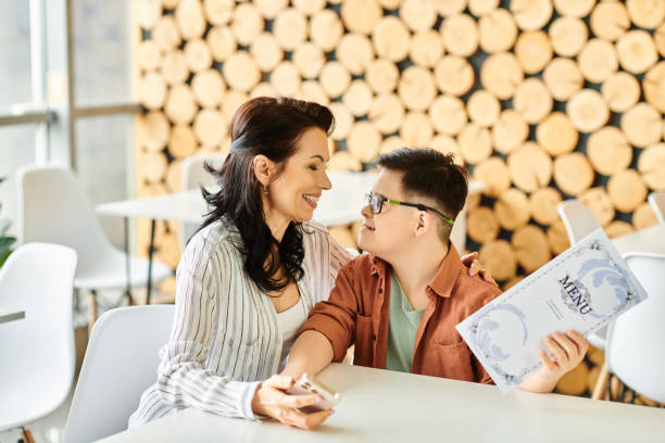 istock Joyful moments shared between a mother and her son enjoying a cafe outing together 2190692189