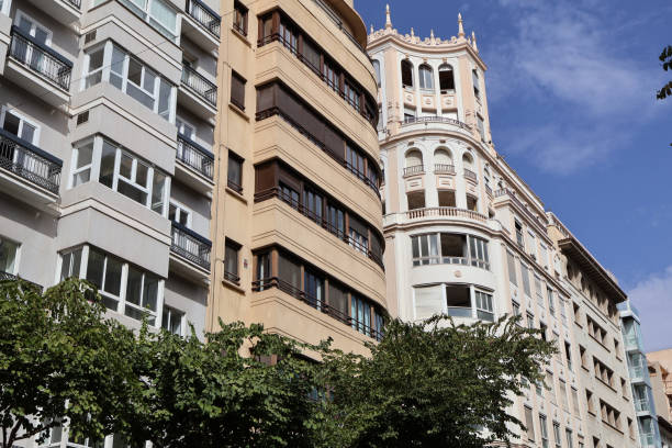 istock Architectural contrast between modern and historic buildings 2190696246