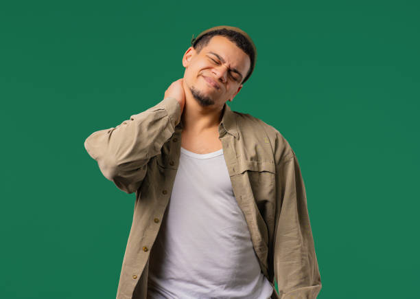 istock Tired young man feeling pain in neck joint, massaging muscles, rubbing head. 2190696803