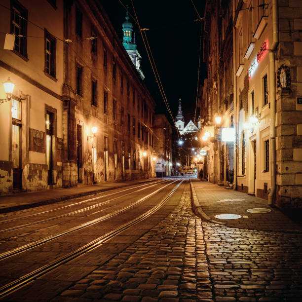 Empty street with tram tracks in the city centre of Lviv, Ukraine - July 04 2014.