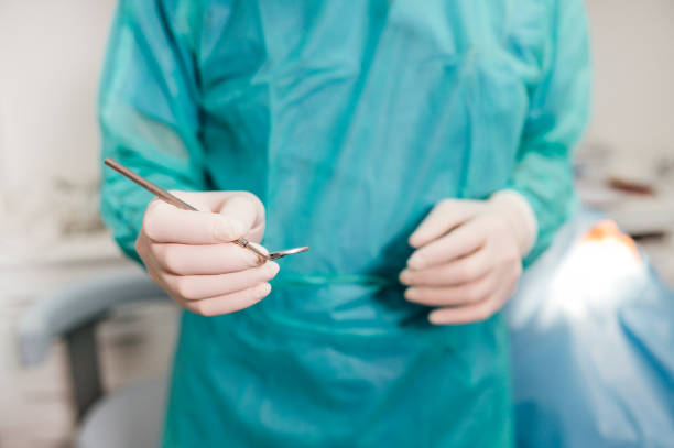 Dentist holding a mirror dental tool