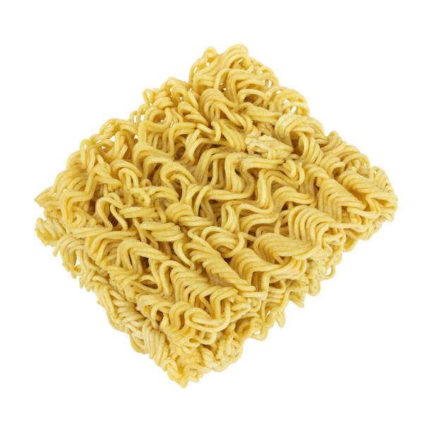 istock raw instant noodles, noodle briquette isolated from background 2190701189