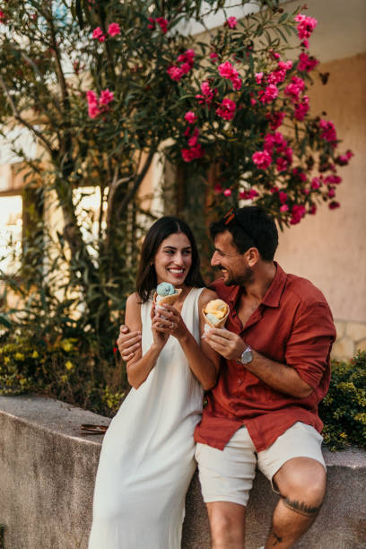 istock Couple eating ice cream cones 2190702295
